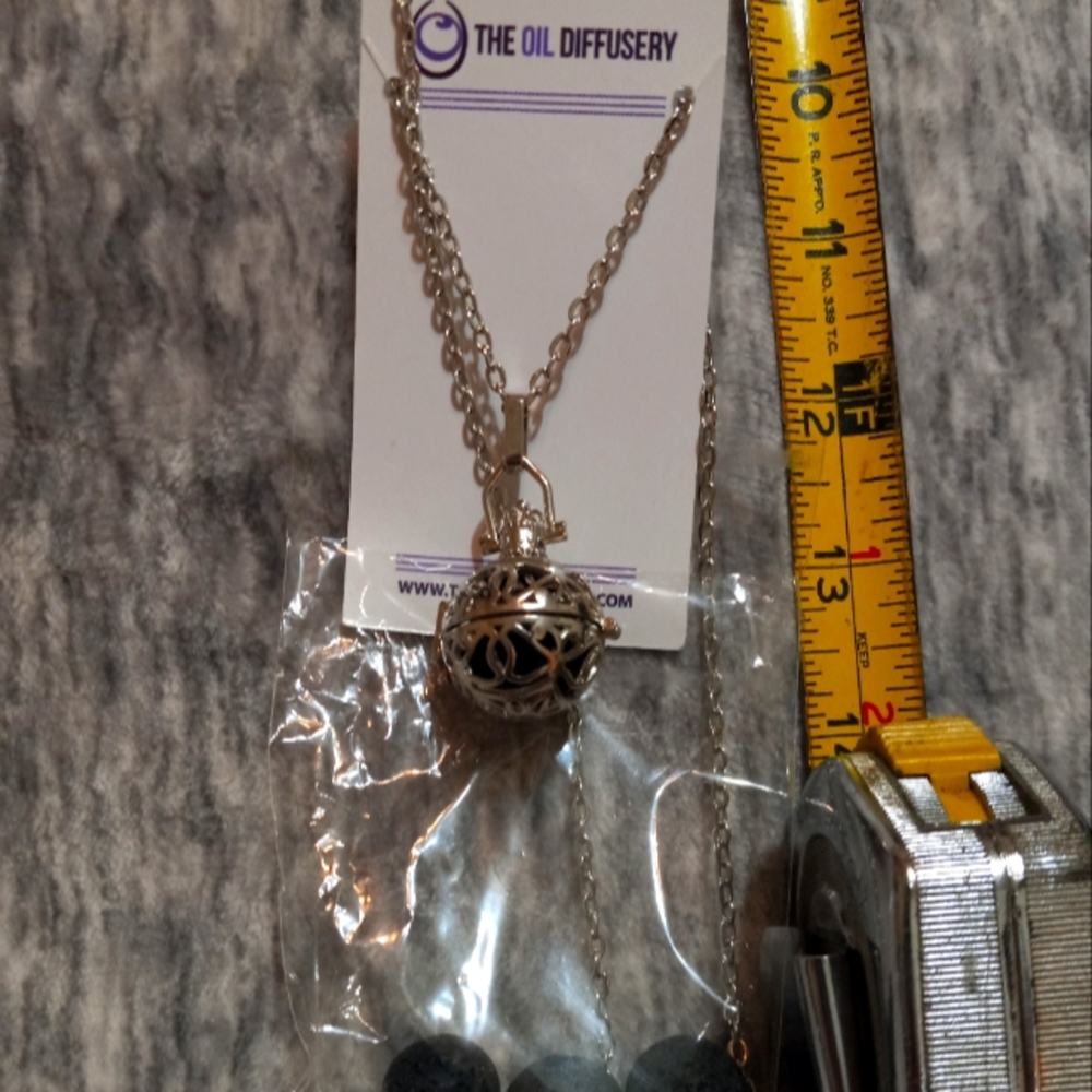 "The Oil Diffusery"  Ball Necklace, New in bag